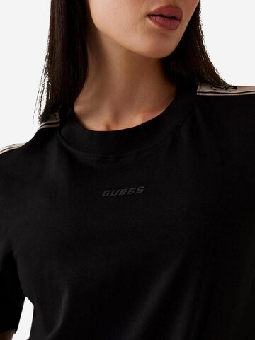 Top 'BRITNEY CROP TEE V3RI08 I3Z14' di GUESS in nero