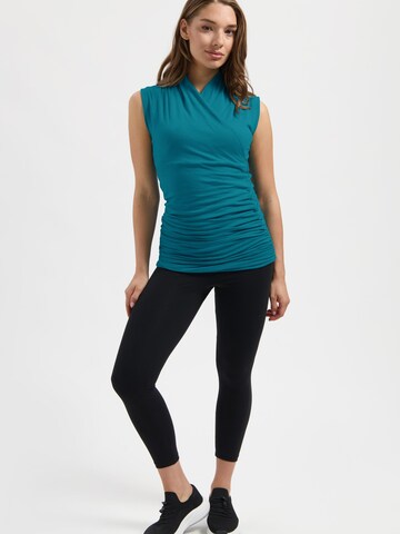 Urban Goddess Yoga & Activewear Sporttop 'Good Karma Yoga & Pilates' in Blau