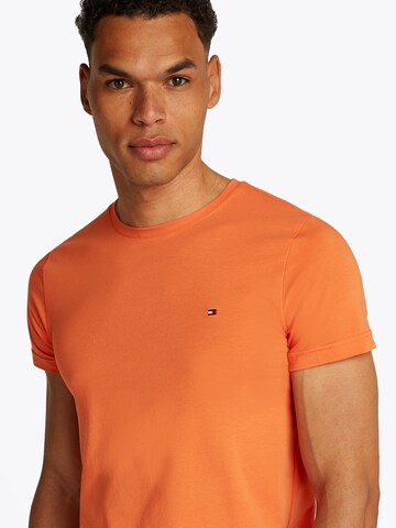 TOMMY HILFIGER Slim fit Koszulka w kolorze pomarańczowy