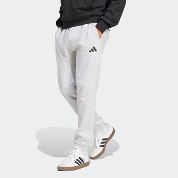 ADIDAS SPORTSWEAR - Tapered Pantalón deportivo 'FEELCOZY' en gris: frente