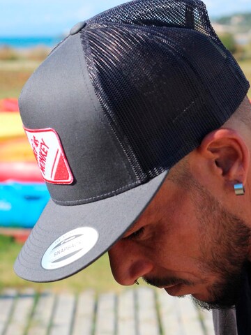 Cappello da baseball sportivo di Surf Monkey in rosso