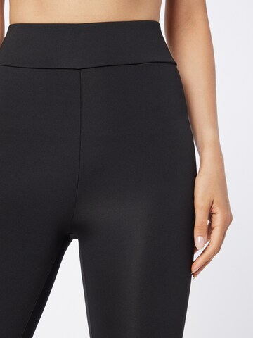 Skinny Pantalon de sport 'Enie' ABOUT YOU en noir