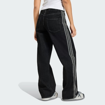 Loosefit Jeans 'Firebird Track' di ADIDAS ORIGINALS in nero