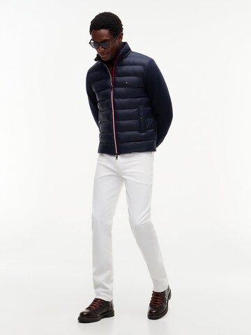 TOMMY HILFIGER Prehodna jakna 'Ess' | modra barva