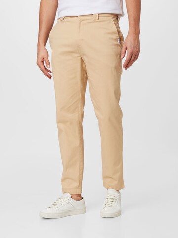 Tommy Jeans Regular Chinobyxa 'DAD' i beige: framsida