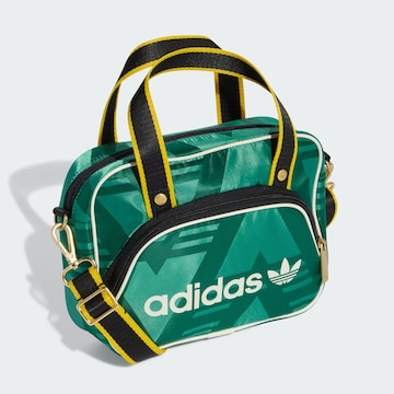 ADIDAS ORIGINALS Handtasche 'Airliner' in Grün