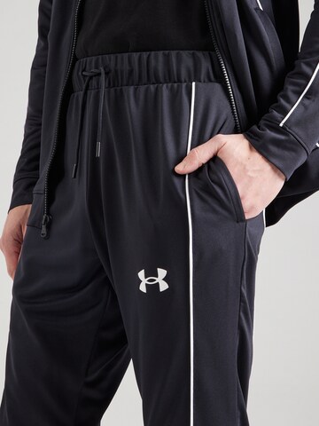 Completo per l'allenamento 'Novelty' di UNDER ARMOUR in nero
