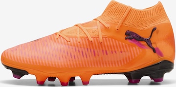 Chaussure de foot PUMA en orange : devant