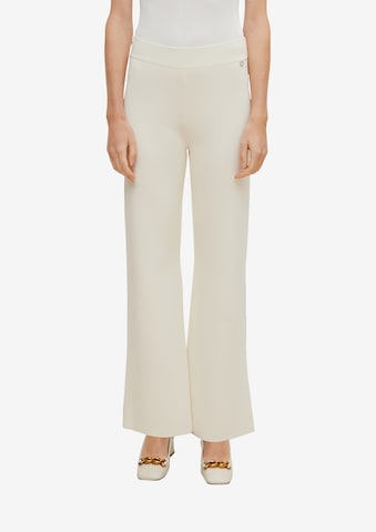 COMMA Boot cut Trousers in Beige: front