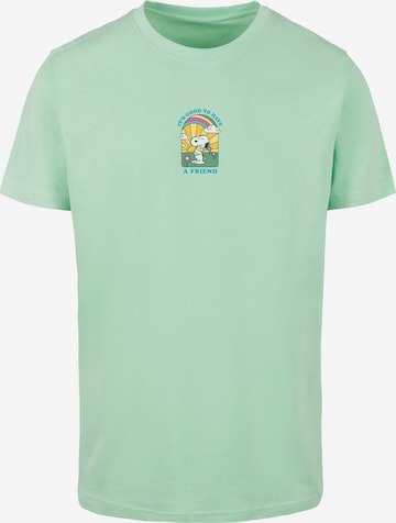 Merchcode T-Shirt  'Peanuts - It's Good To Have A Friend' in Grün: predná strana