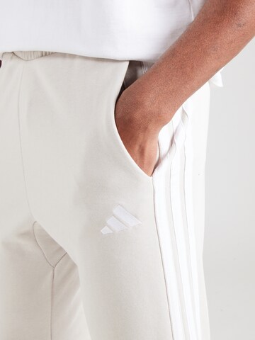 ADIDAS SPORTSWEAR Tapered Παντελόνι φόρμας 'Essential' σε γκρι