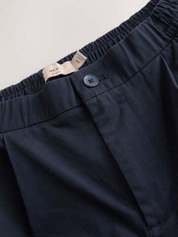 Next Ohlapna forma Chino hlače | modra barva