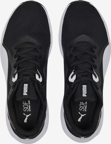 Chaussure de sport 'Twitch Runner' PUMA en noir