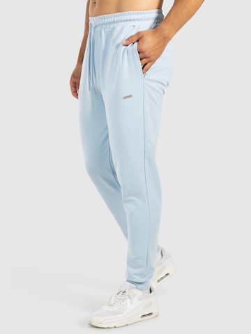 Effilé Pantalon de sport 'Nilo' Smilodox en bleu