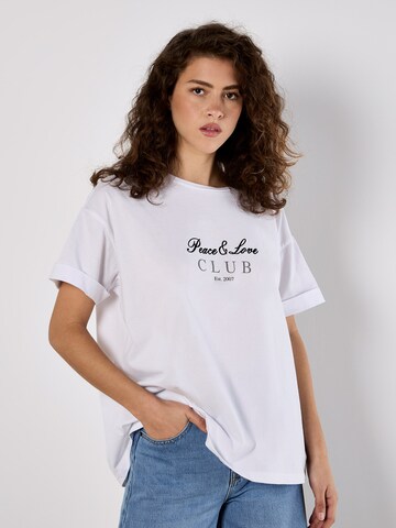 Haut Apricot en blanc