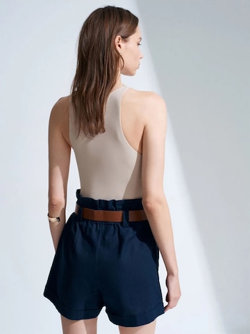 Dilvin - Blusa body em mistura de cores