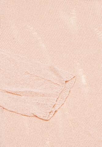 swirly Trui in Roze