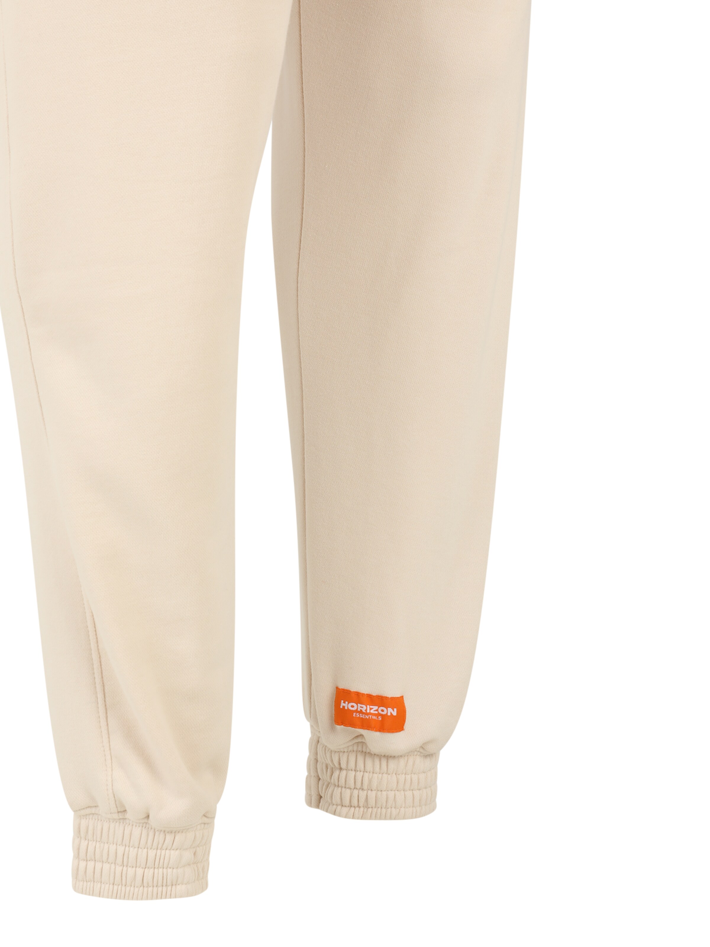 Public Desire Curve Zwężany krój Spodnie w kolorze beżowy