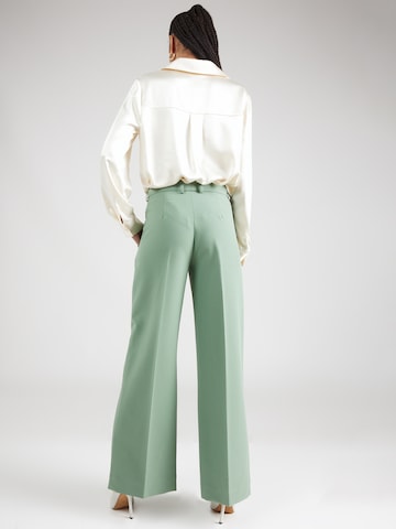 Lovechild 1979 Szeroka nogawka Spodnie w kant 'Harper' w kolorze zielony