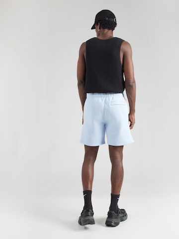 Loosefit Pantaloni di Nike Sportswear in blu: dietro