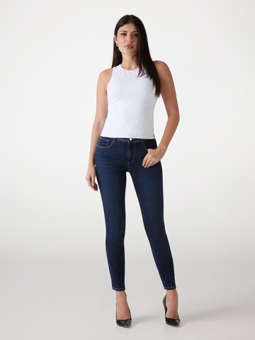 GUESS Skinny Jeans in Blue