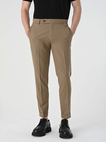 Antioch Tapered Trousers in Brown: front