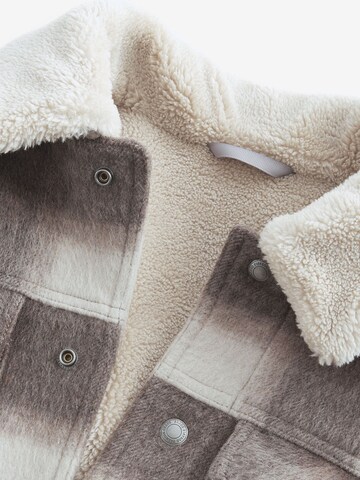 Next Tussenjas in Beige