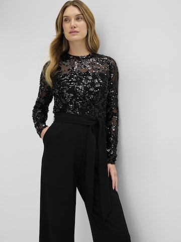 Tuta jumpsuit di bonprix in nero