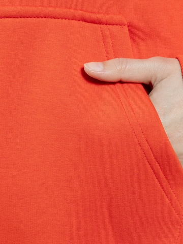 Veste de survêtement Smilodox en rouge