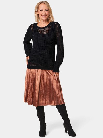 Goldner Pullover in Schwarz