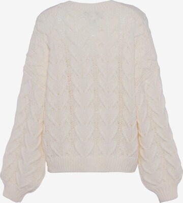 Pullover di faina in bianco