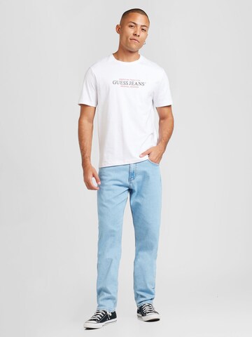 GUESS JEANS Slimfit Farmer - kék