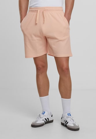 Urban Classics Loose fit Trousers in Orange
