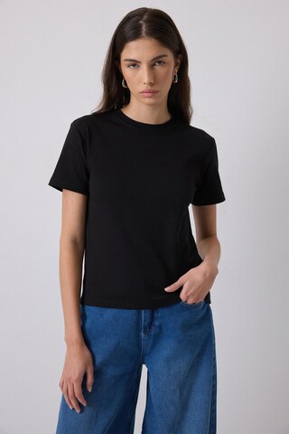 Touche Prive T-shirt in Schwarz: Vorderseite