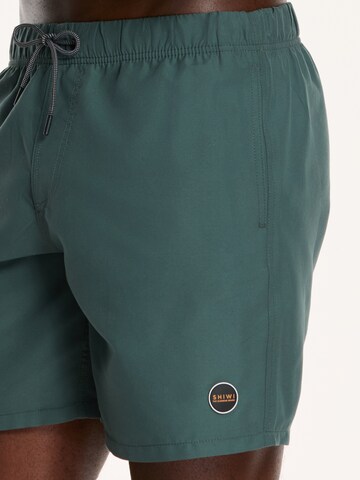 Shiwi Kratke kopalne hlače 'MIKE' | zelena barva