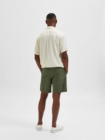 SELECTED HOMME Normalny krój Spodnie 'Newton' w kolorze zielony