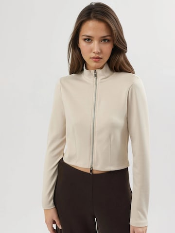 Busem Tussenjas in Beige: voorkant