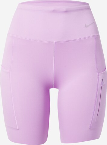 NIKE Skinny Sports trousers in Purple: front