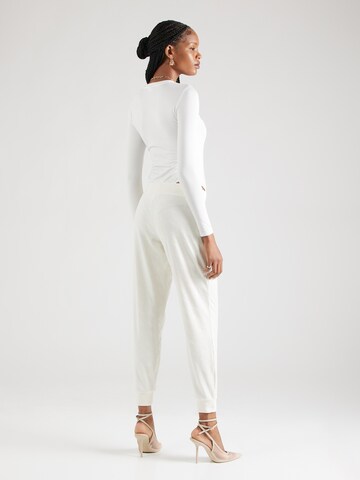 Juicy Couture Tapered Housut 'Pipa' värissä valkoinen