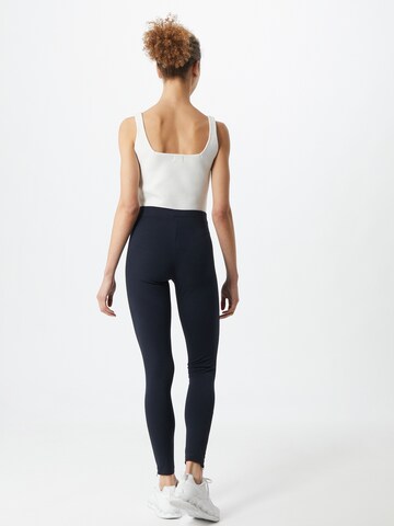 Skinny Pantalon de sport Champion Authentic Athletic Apparel en bleu