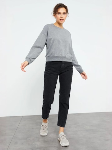 Sweat-shirt Tommy Life en gris