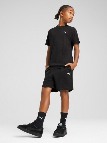 PUMA T-shirt 'WARDROBE ESS' i svart