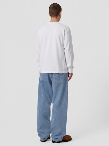 Carhartt WIP Baggy Jeans 'LANDON PANT Blue, Heavy stone wash' in Blauw