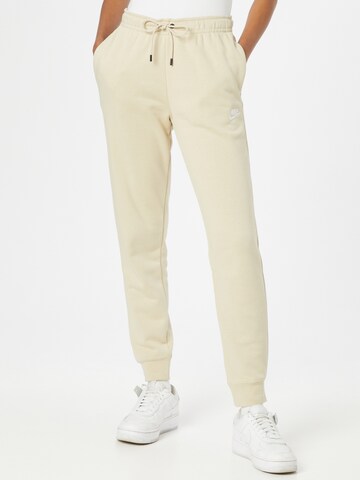 Effilé Pantalon Nike Sportswear en beige : devant