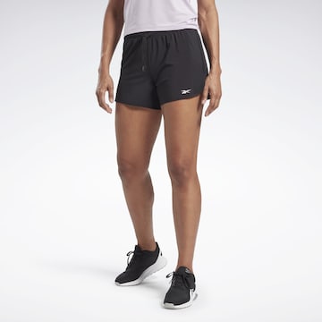 Reebok Regular Workout Pants in Black: front