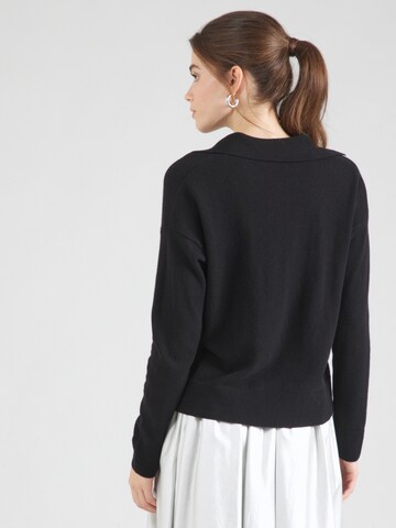 Pull-over Sisley en noir