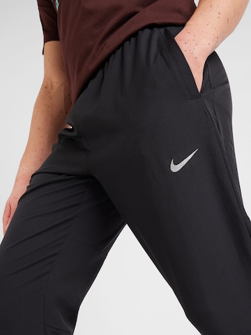 NIKE Tapered Sportbroek 'CHALLENGER' in Zwart