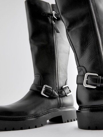 Boots Next en noir