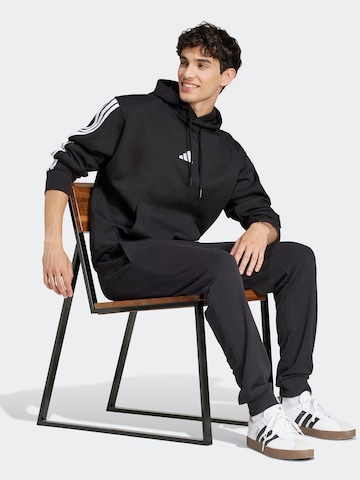 ADIDAS SPORTSWEAR Αθλητική μπλούζα φούτερ 'Essentials' σε μαύρο: μπροστά