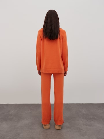 Bootcut Pantaloni 'Lunette' di EDITED in arancione
